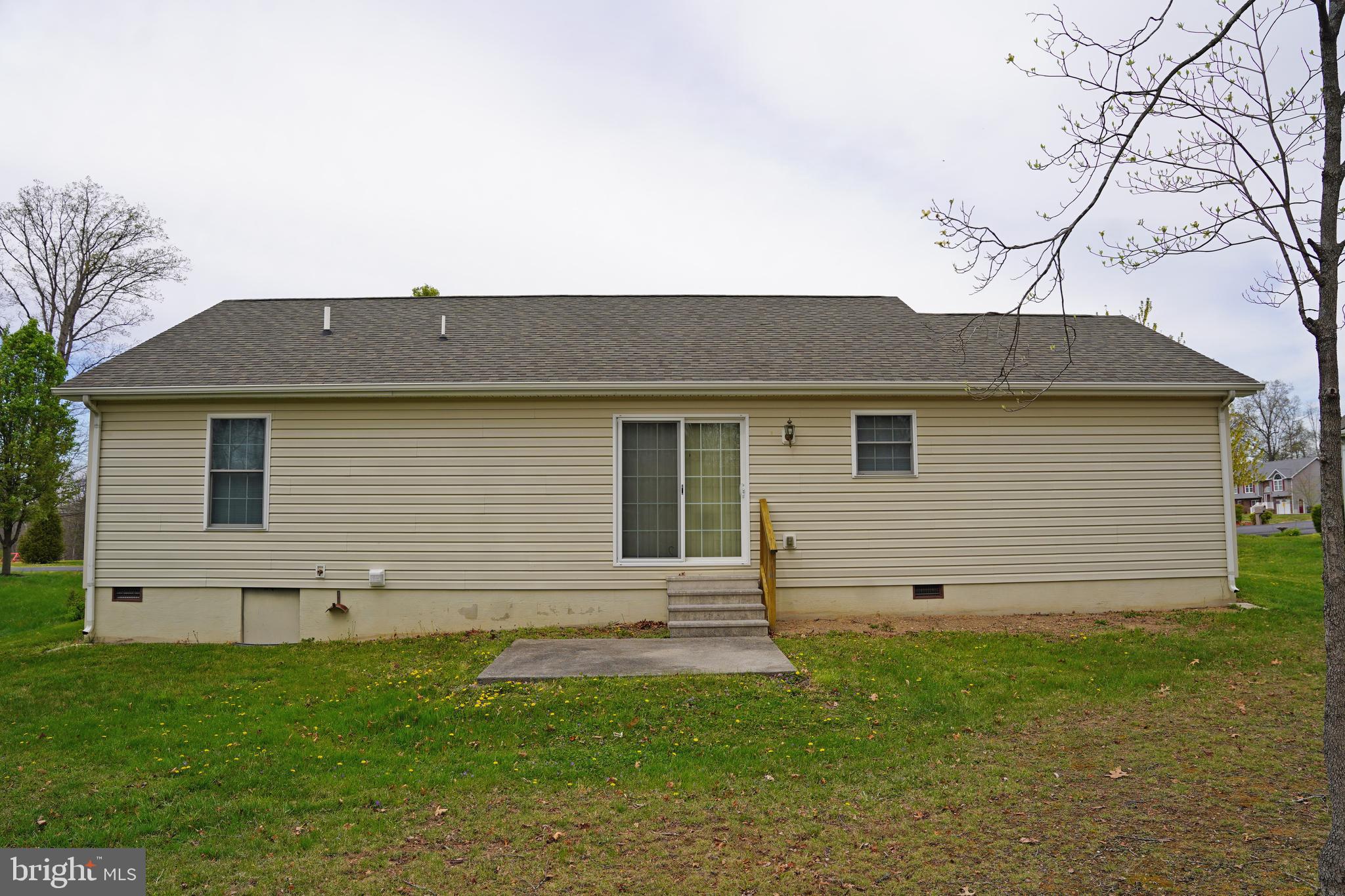 122 Sinker Drive Inwood, WV 25428 - Photo 24 of 28 a front view of house with yard