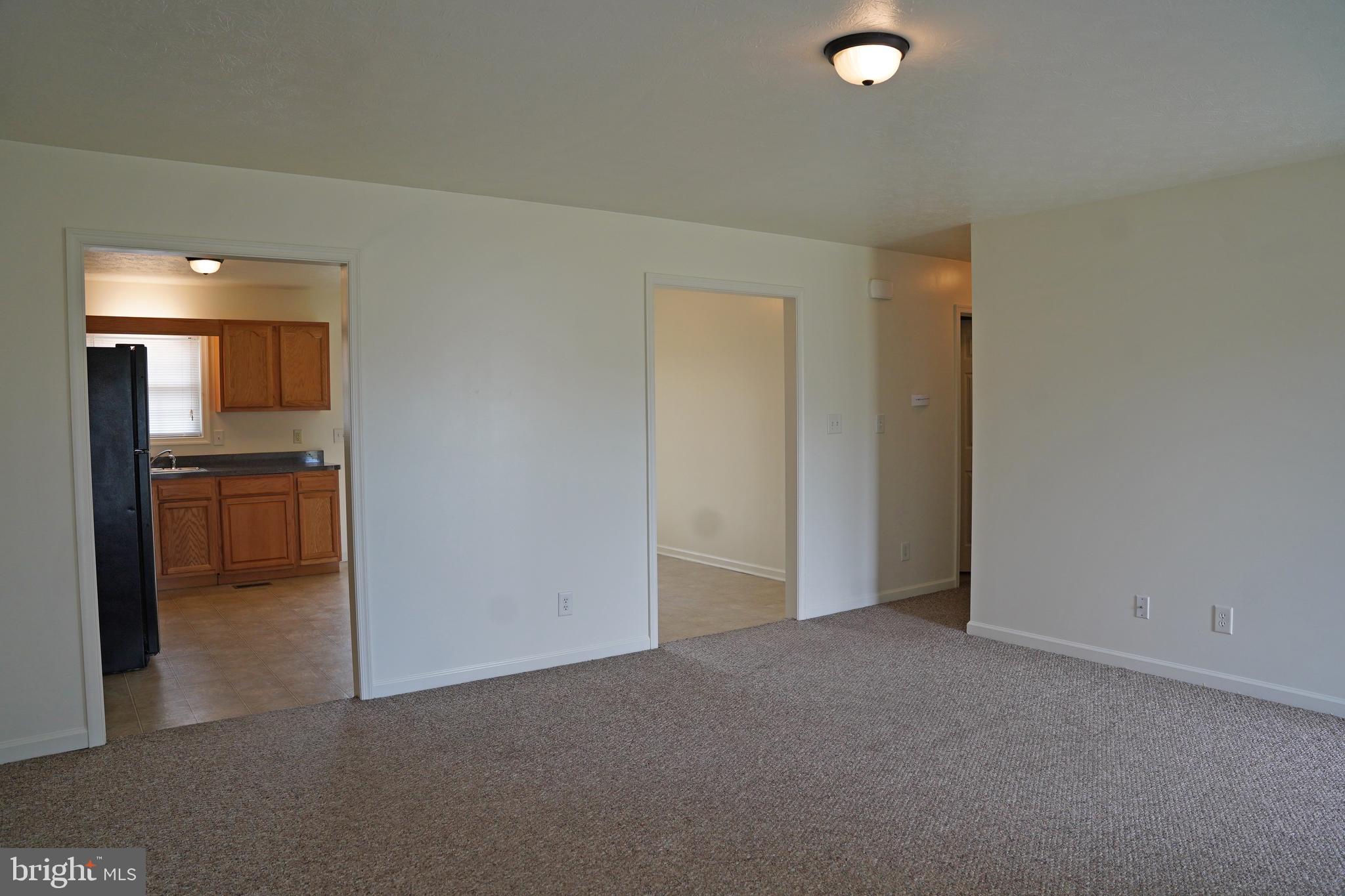 122 Sinker Drive Inwood, WV 25428 - Photo 3 of 28 a view of a livingroom and a kitchen space