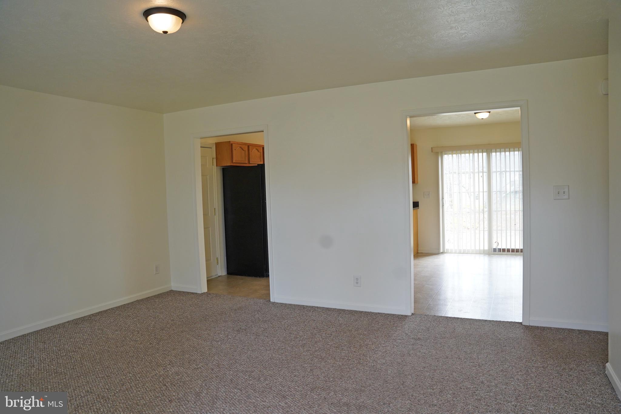 122 Sinker Drive Inwood, WV 25428 - Photo 4 of 28 an empty room with windows and closet