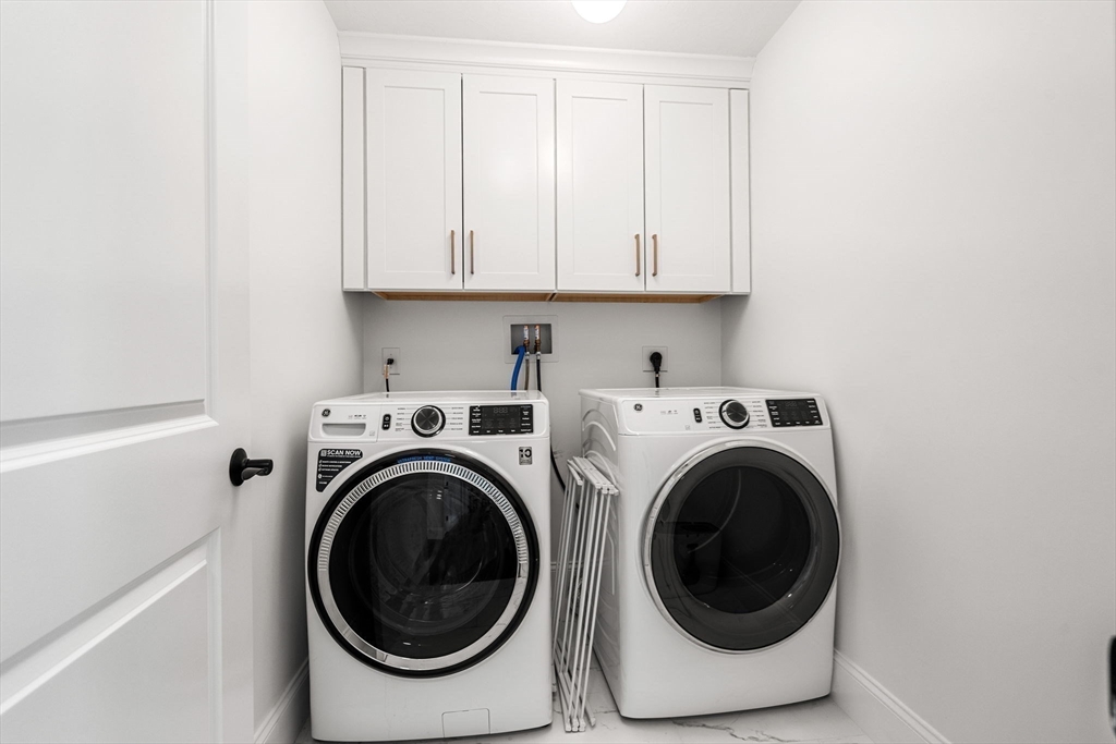 32 Cutter Lane, Unit 32 Amesbury, MA 01913 - Photo 21 of 37 a utility room with dryer and washer