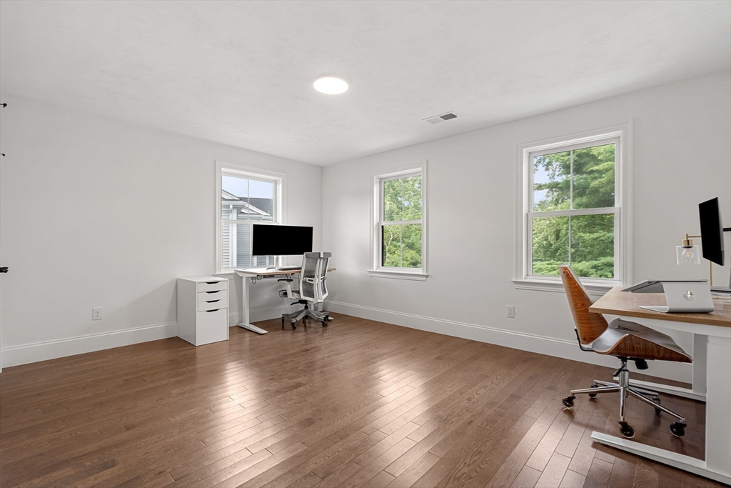 32 Cutter Lane, Unit 32 Amesbury, MA 01913 - Photo 26 of 37 a view of a workspace with furniture and a window