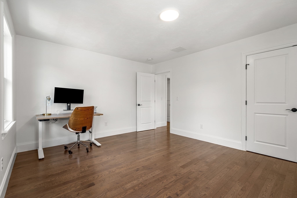 32 Cutter Lane, Unit 32 Amesbury, MA 01913 - Photo 27 of 37 a view of a workspace with furniture and a window