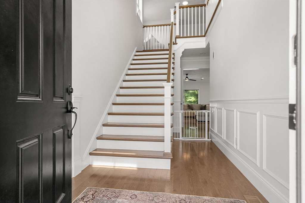 32 Cutter Lane, Unit 32 Amesbury, MA 01913 - Photo 29 of 37 a view of entryway and hall with wooden floor