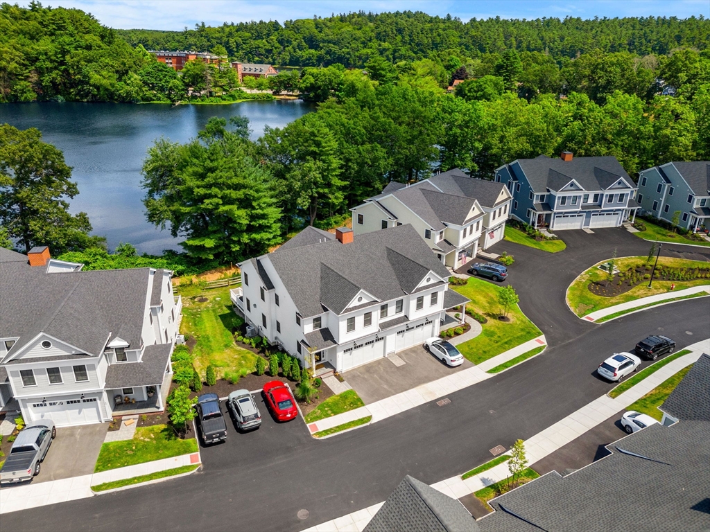 32 Cutter Lane, Unit 32 Amesbury, MA 01913 - Photo 33 of 37 an aerial view of residential houses with outdoor space