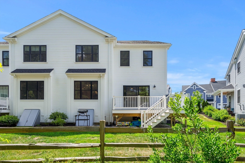 32 Cutter Lane, Unit 32 Amesbury, MA 01913 - Photo 35 of 37 a front view of a house with a yard