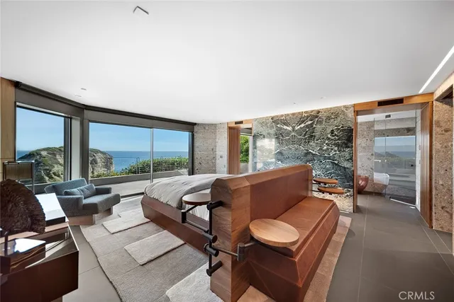 an aerial view of a house with a lake view