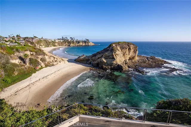 an aerial view of a house with a garden