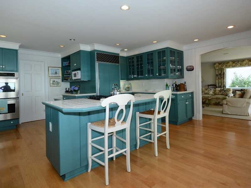 16 Rocky Point Road Rowayton, CT 06853 - Photo 11 of 25 a dining room with furniture and a kitchen view
