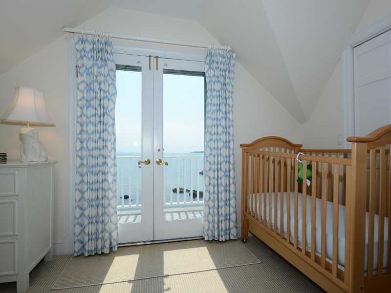 16 Rocky Point Road Rowayton, CT 06853 - Photo 18 of 25 a view of a hallway with entryway of a house