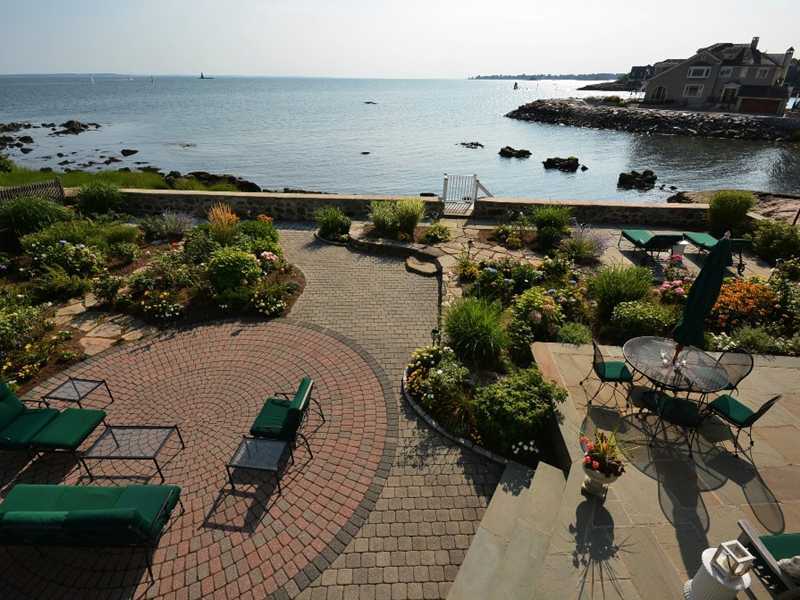 16 Rocky Point Road Rowayton, CT 06853 - Photo 19 of 25 an aerial view of a house with a yard and lake view