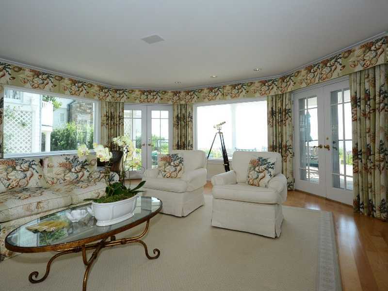 16 Rocky Point Road Rowayton, CT 06853 - Photo 7 of 25 a living room with furniture and a large window