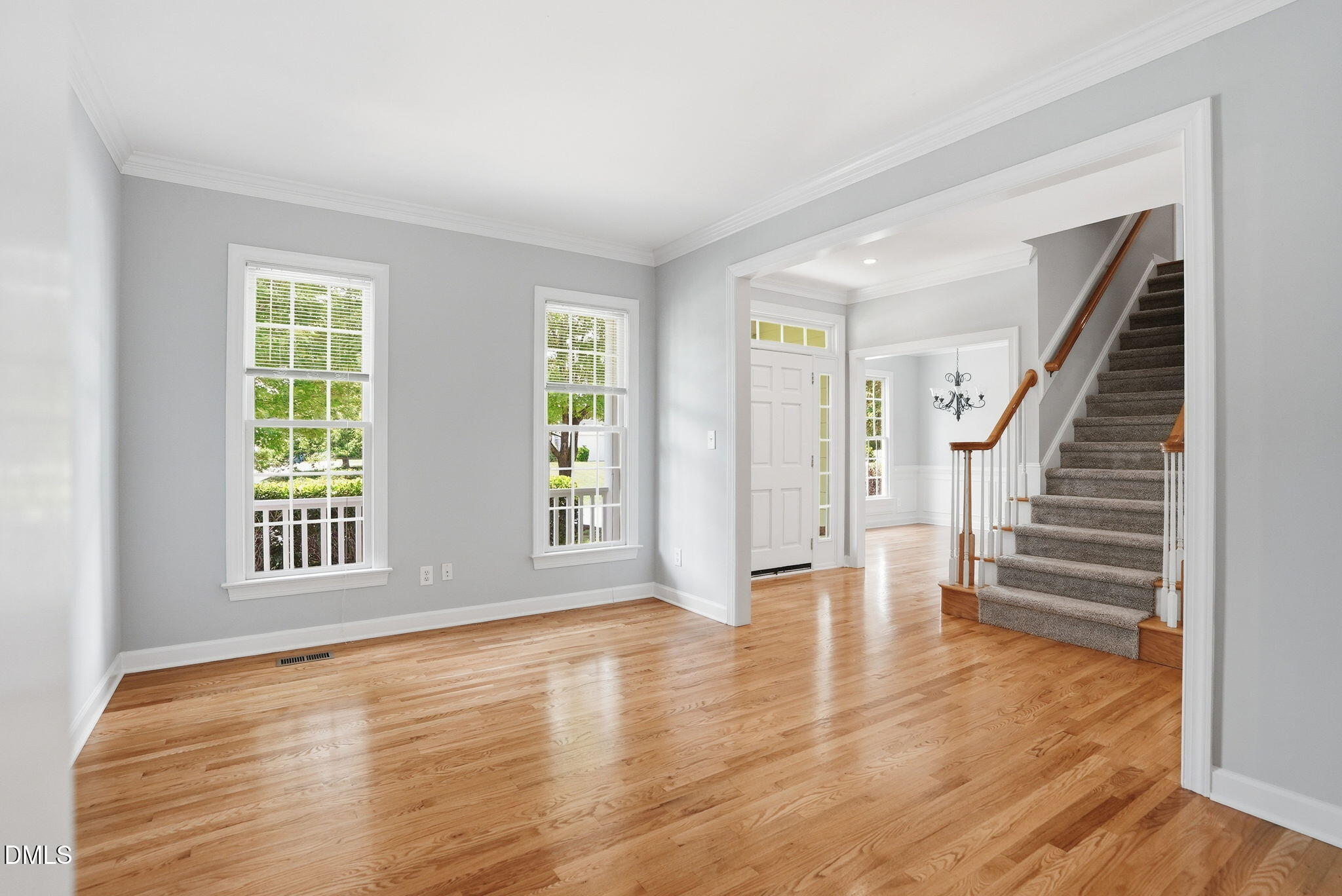 7 Morgans Ridge Lane Durham, NC 27707 - Photo 15 of 75 a view of an empty room with wooden floor and a window