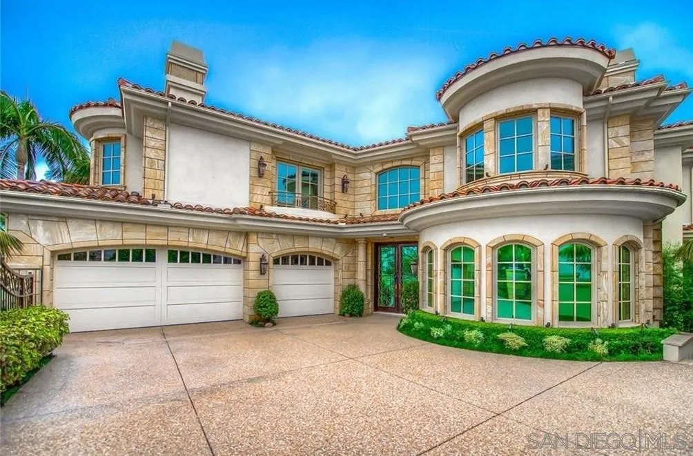 7141 Aviara Drive Carlsbad, CA 92011 - Photo 1 of 1 a front view of a house with a garden