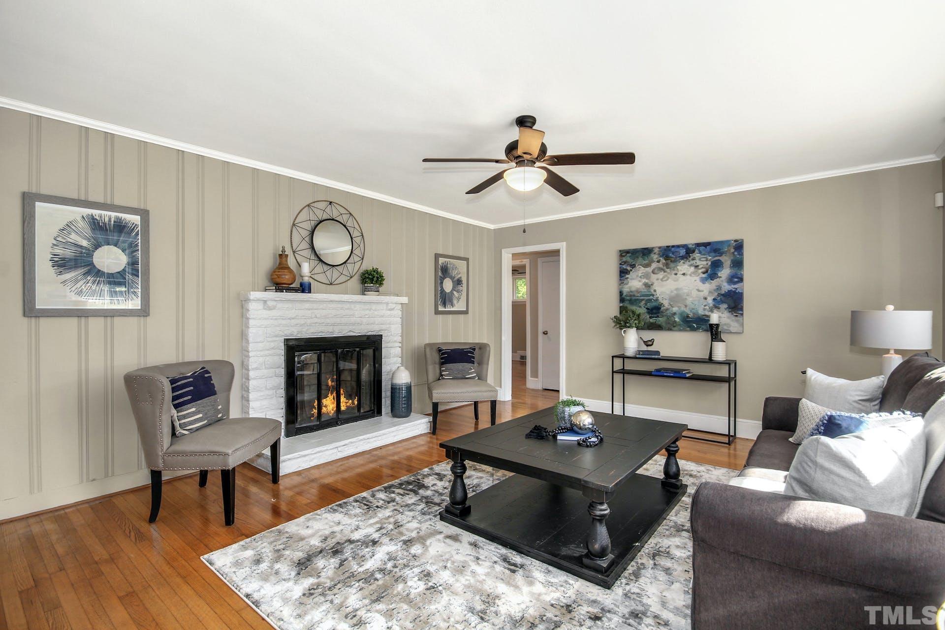 2805 Haven Road Raleigh, NC 27610 - Photo 3 of 29 a living room with furniture and a fireplace