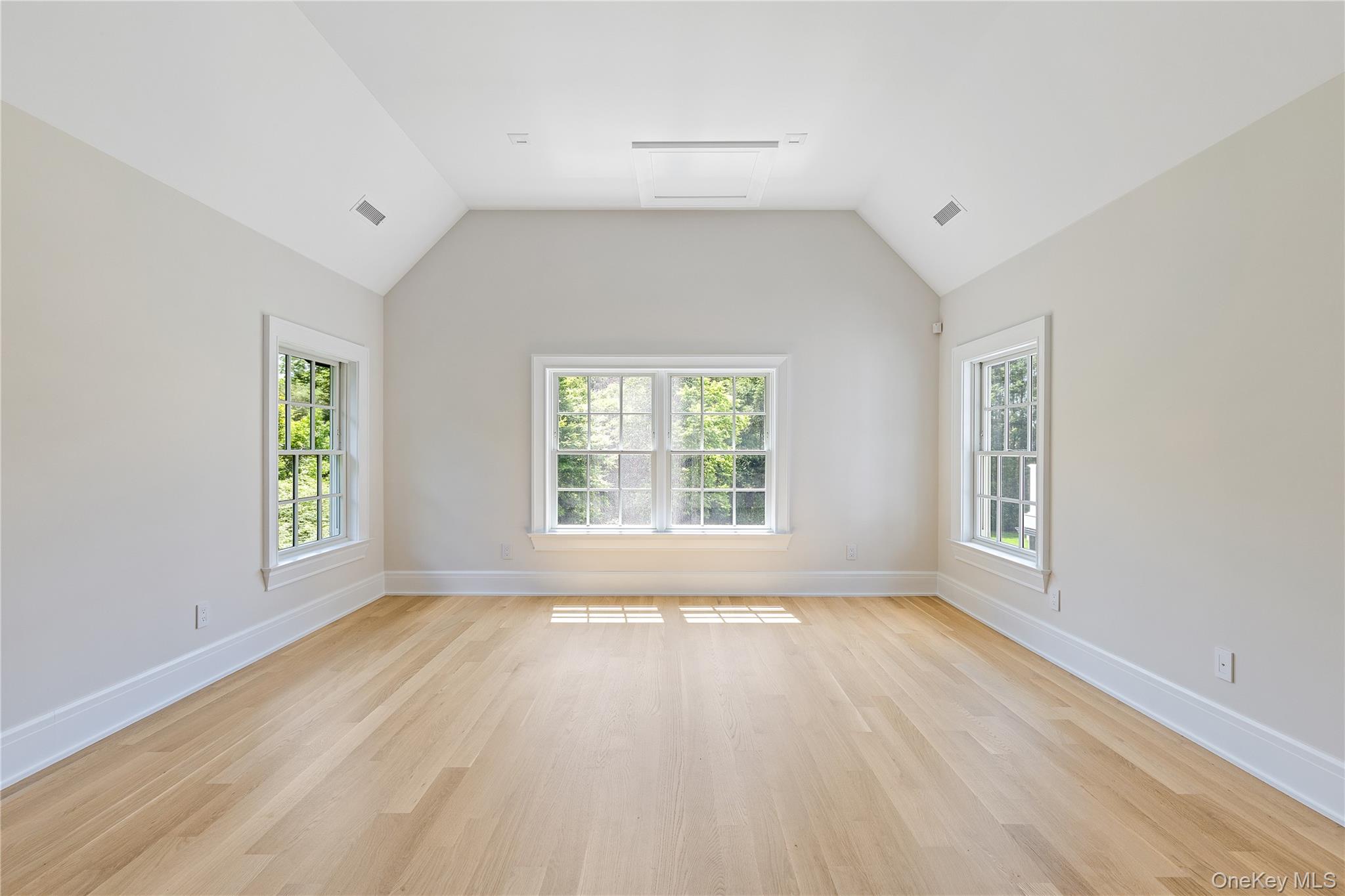 42 Mamaroneck Road Scarsdale, NY 10583 - Photo 34 of 47 The guest bedroom offers vaulted ceilings, generous proportions, and a peaceful atmosphere for family and visitors alike.