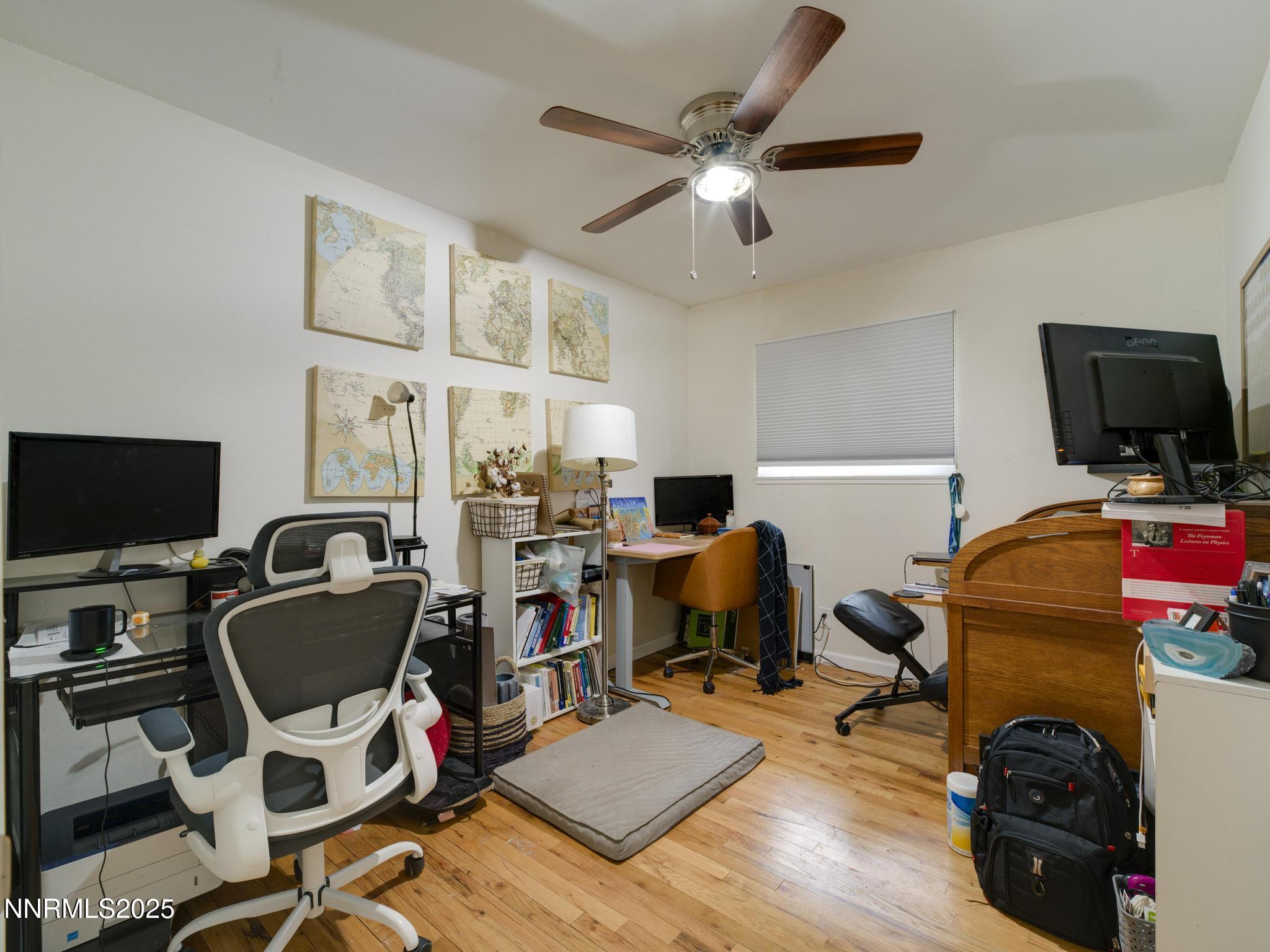 1840 Windsor Way Reno, NV 89503 - Photo 19 of 21 a view of a workspace with furniture and a flat screen tv