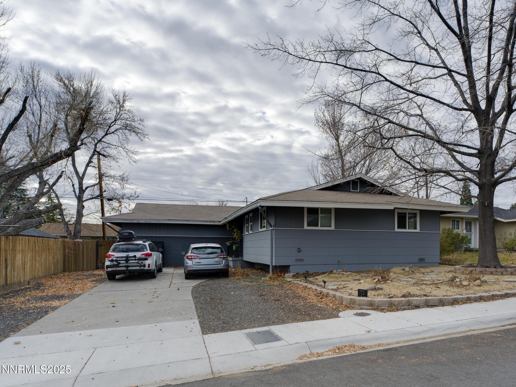 1840 Windsor Way Reno, NV 89503 - Photo 2 of 21 a car parked in front of a house