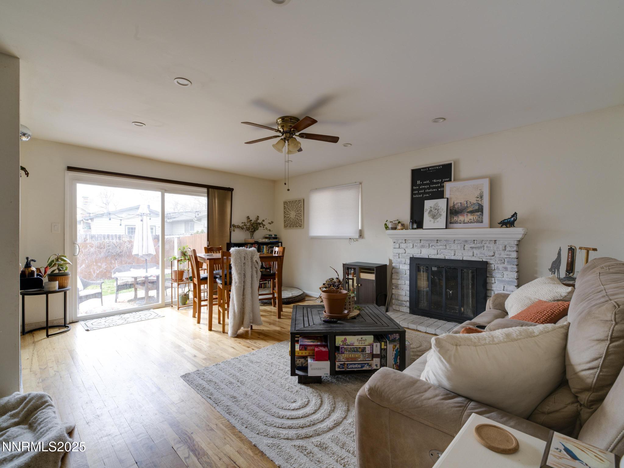 1840 Windsor Way Reno, NV 89503 - Photo 7 of 21 a living room with furniture and a fireplace