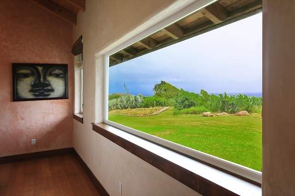 560 North Holokai Road Haiku, HI 96708 - Photo 12 of 30 a view of a back yard from a window