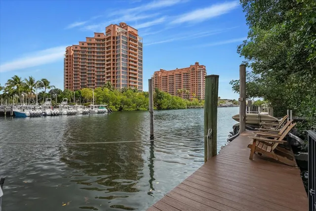 a view of tall buildings and a lake view