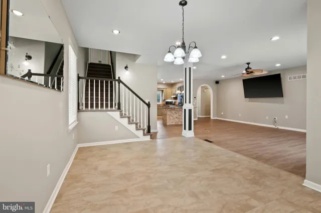 a view of a livingroom with a kitchen