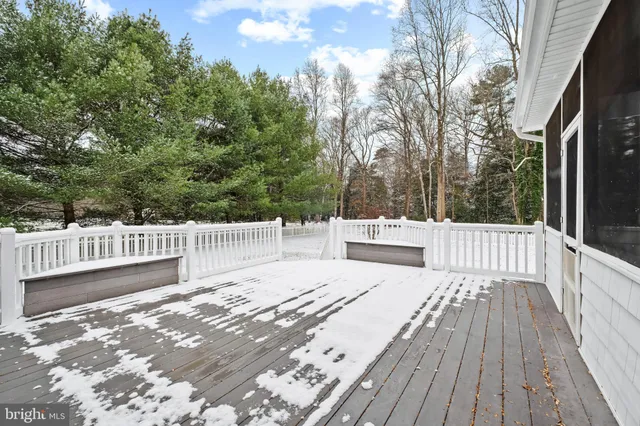 a view of snow on the side of a road