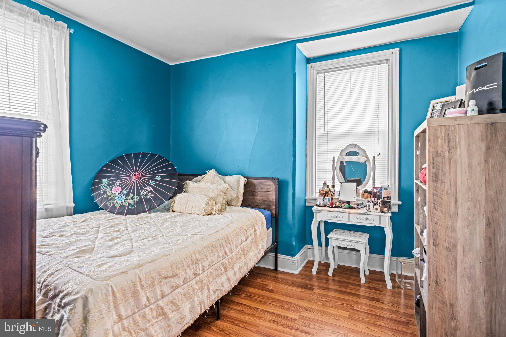 127 Cleveland Avenue Riverside, NJ 08075 - Photo 15 of 23 a bedroom with a bed and a table