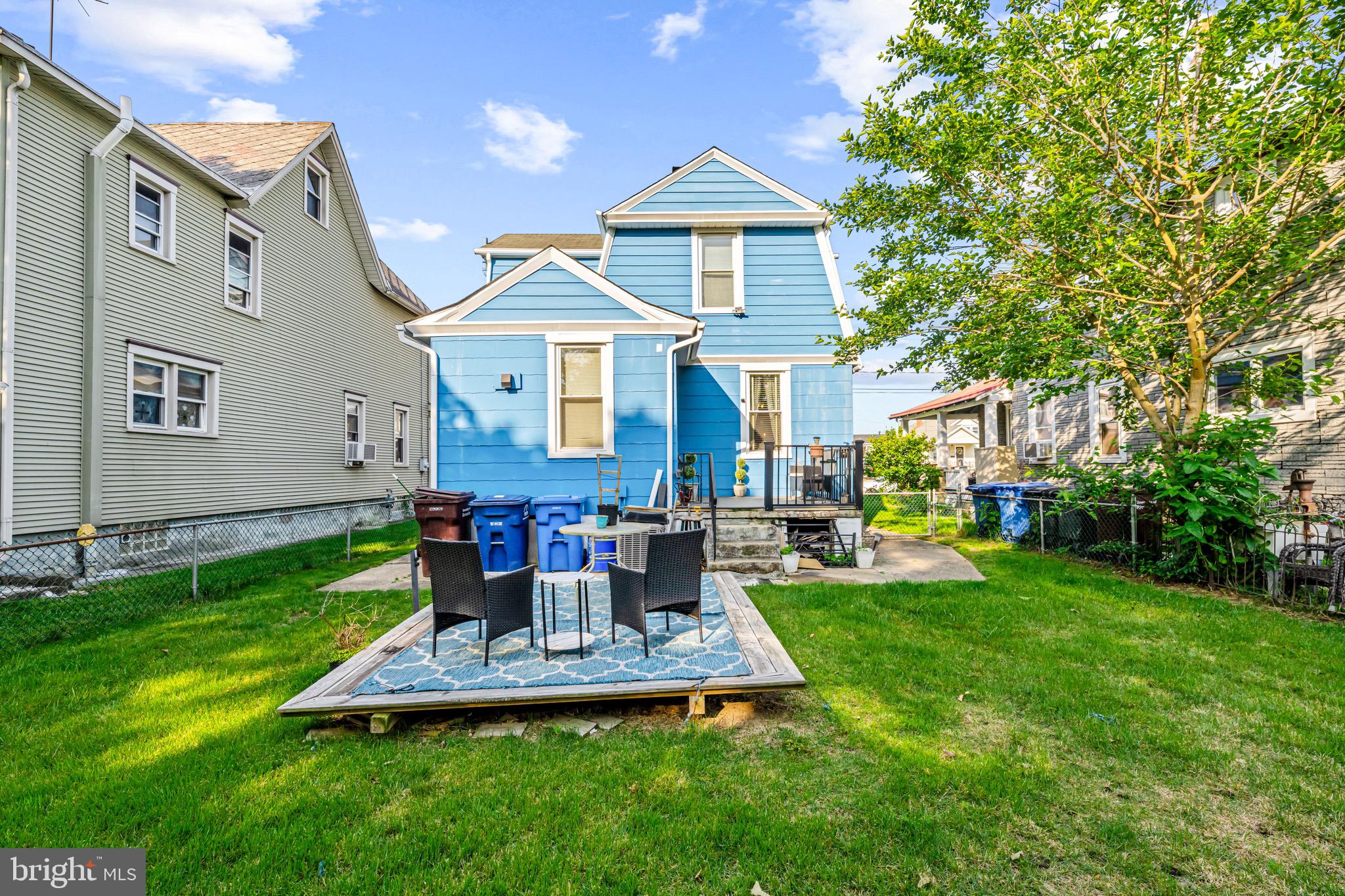 127 Cleveland Avenue Riverside, NJ 08075 - Photo 20 of 23 a front view of house with yard and outdoor seating
