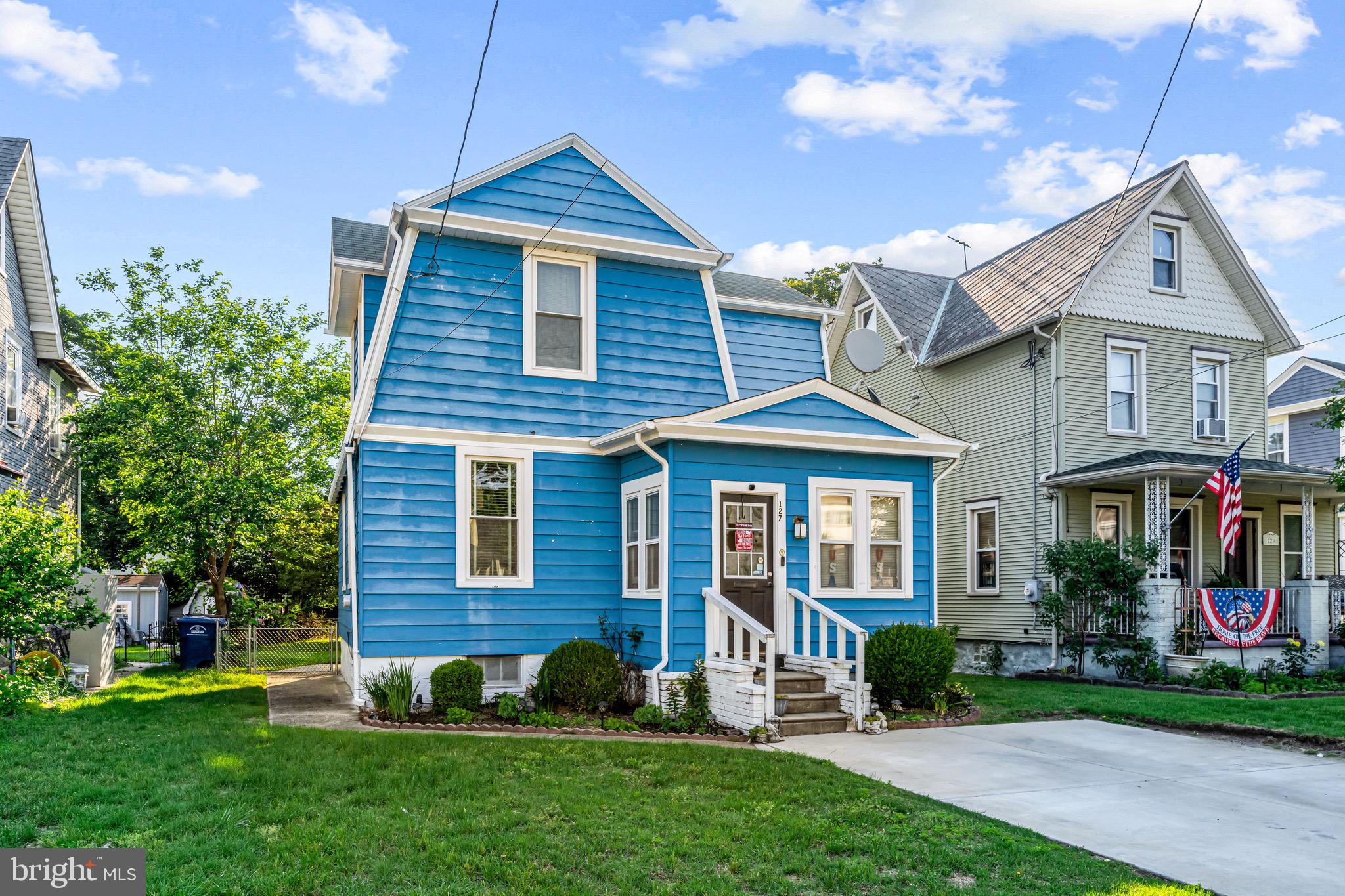 127 Cleveland Avenue Riverside, NJ 08075 - Photo 2 of 23 a front view of a house with a yard