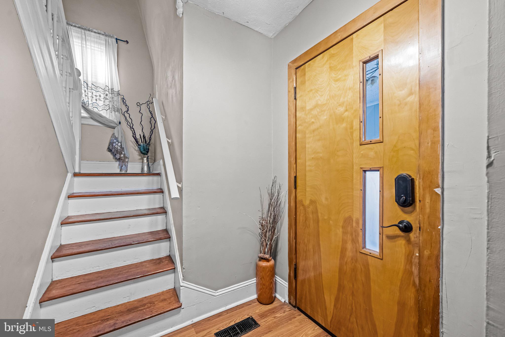 127 Cleveland Avenue Riverside, NJ 08075 - Photo 3 of 23 a view of a door with wooden floor