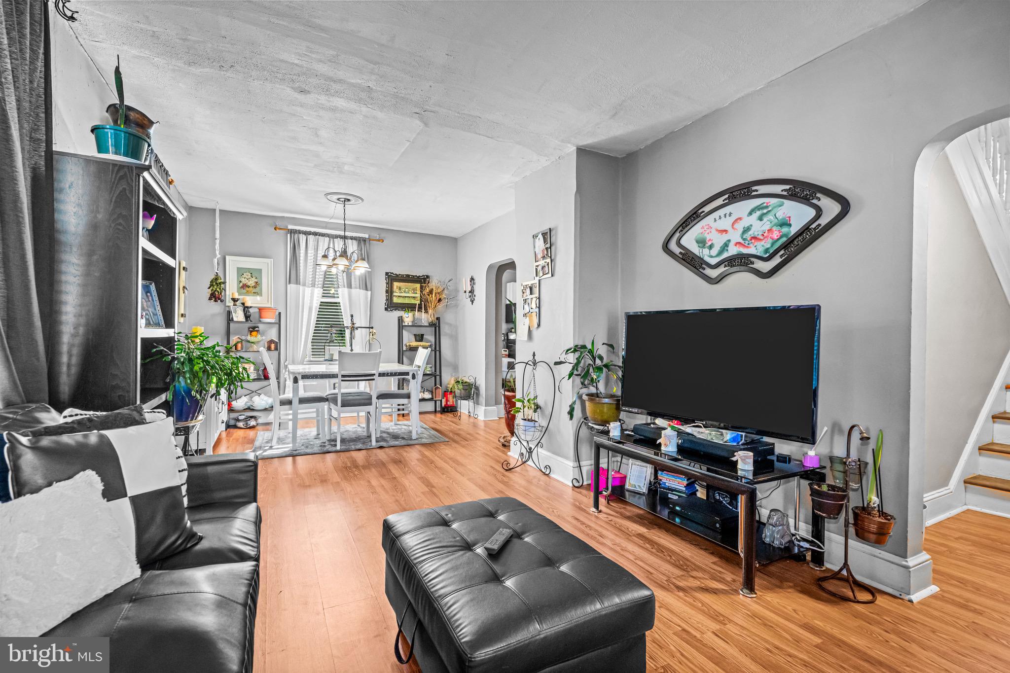 127 Cleveland Avenue Riverside, NJ 08075 - Photo 8 of 23 a living room with furniture and a flat screen tv