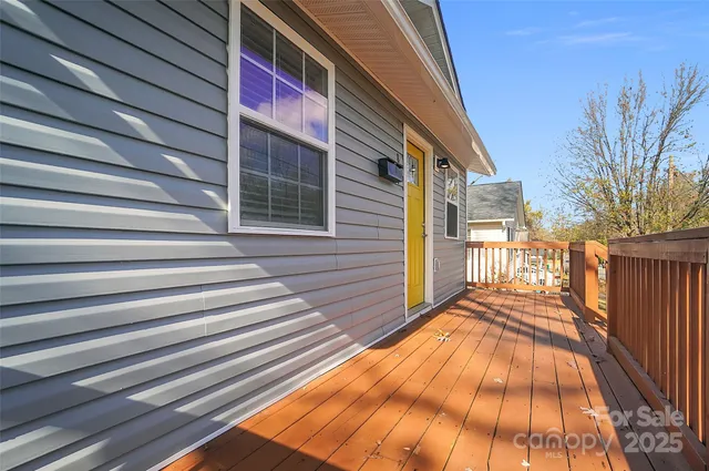 a view of a yard with large trees