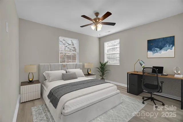 a bedroom with a workspace