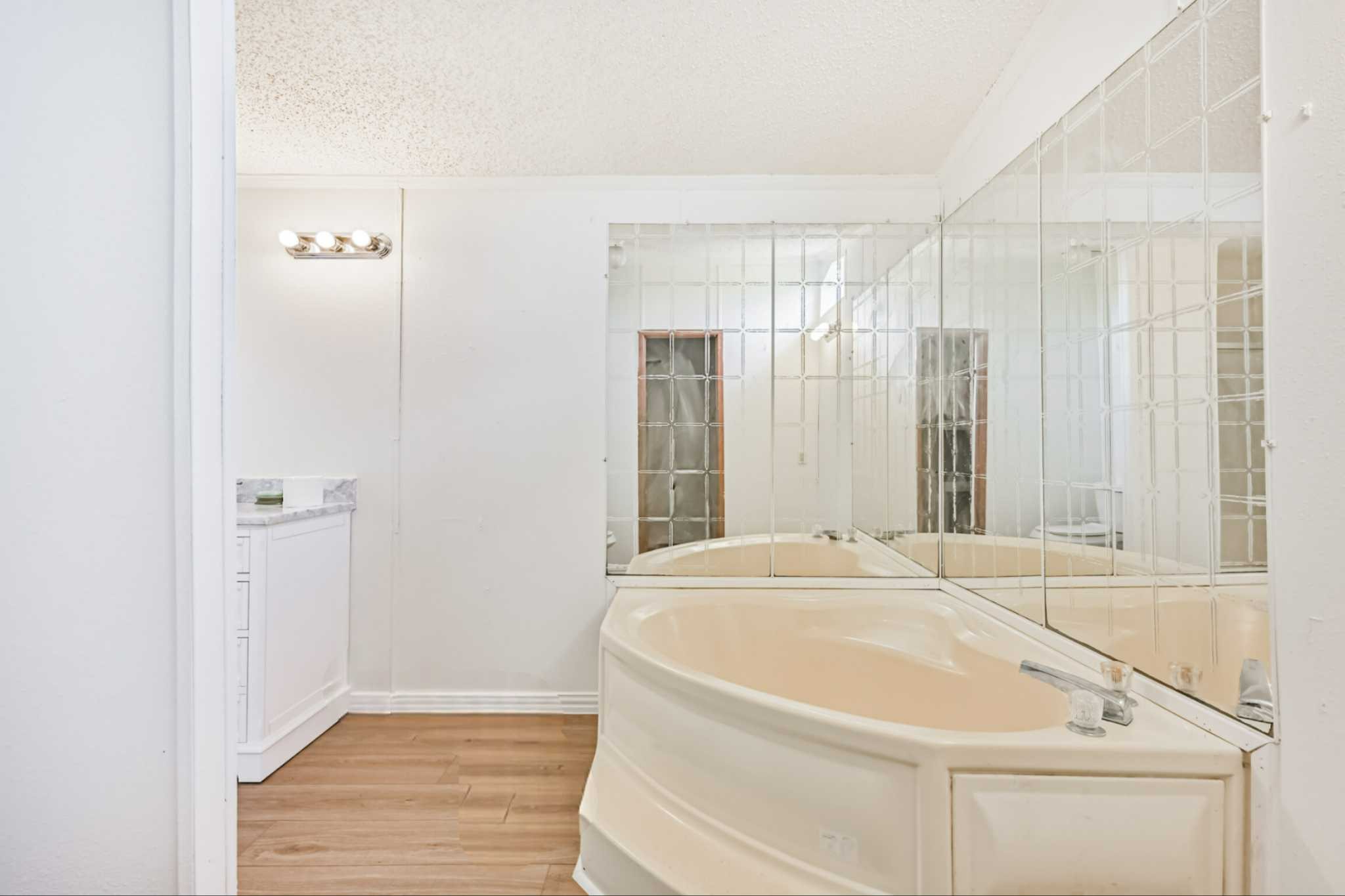 14515 Farm To Market Road 523 Angleton, TX 77515 - Photo 20 of 25 a bathroom with a bathtub and a shower