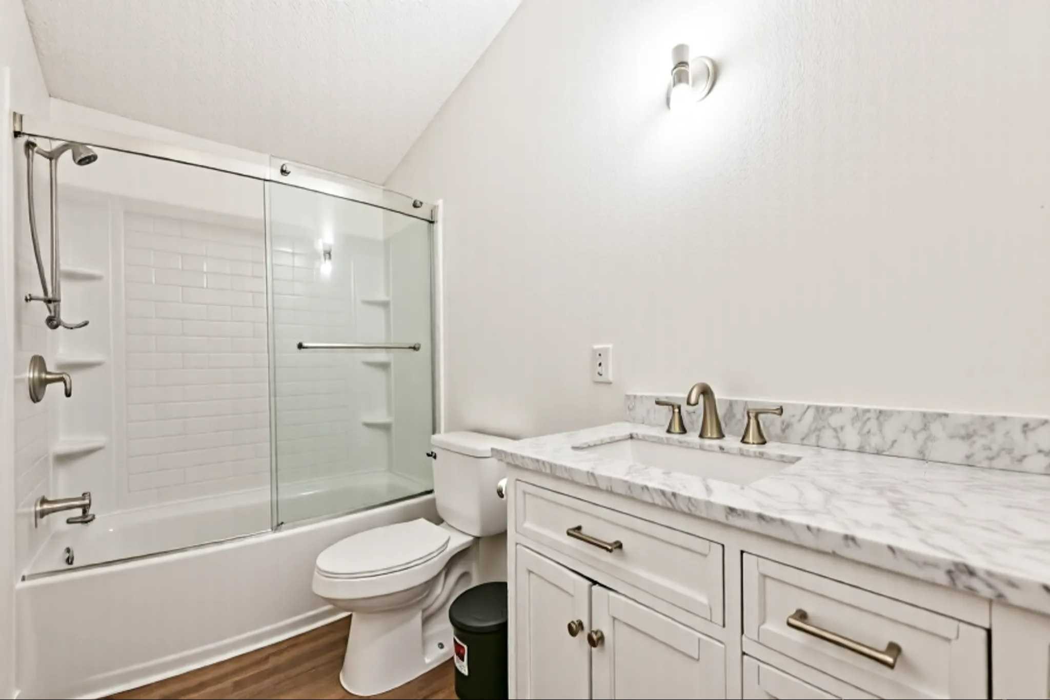 14515 Farm To Market Road 523 Angleton, TX 77515 - Photo 23 of 25 a bathroom with a granite countertop sink toilet and shower