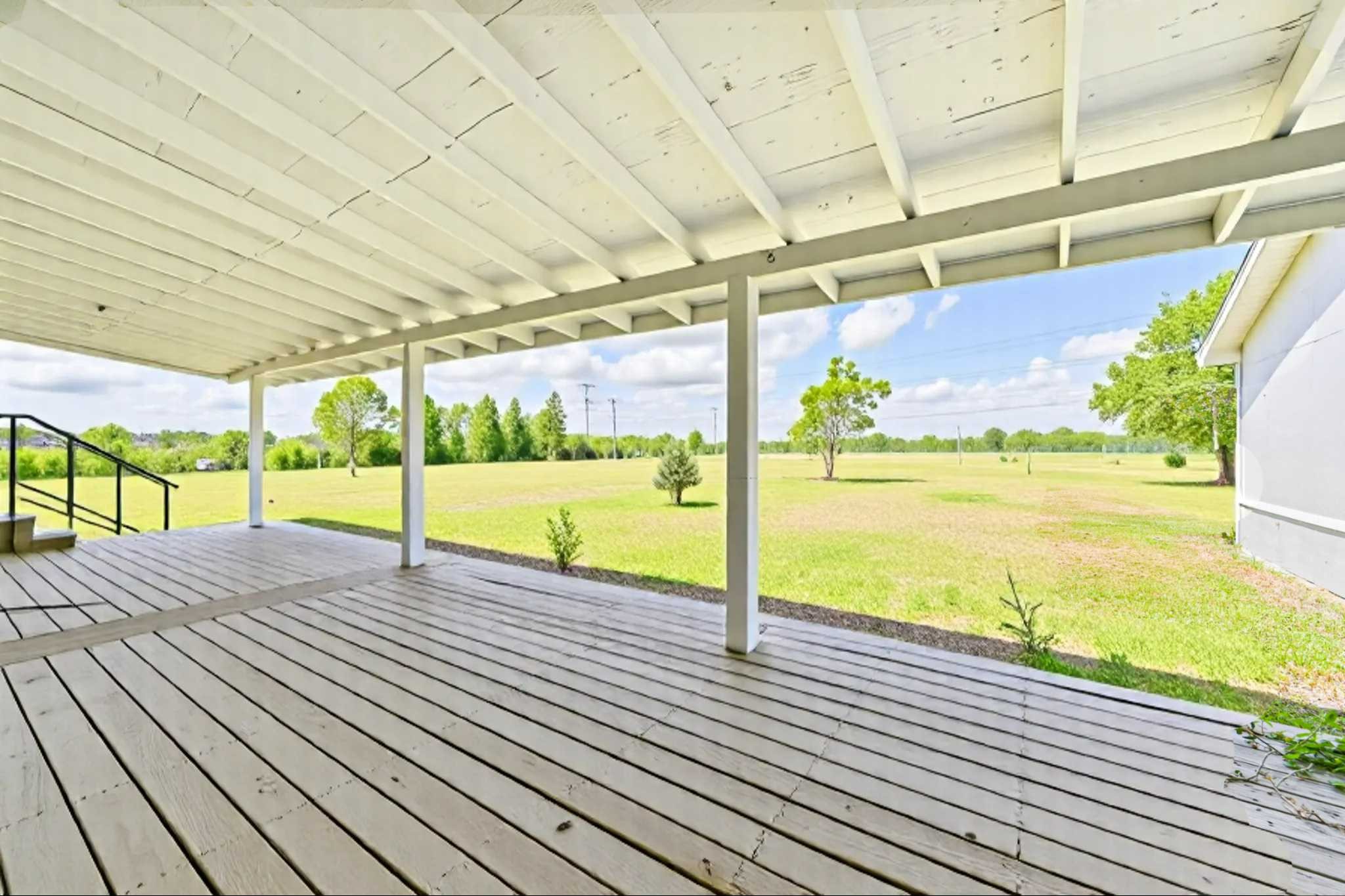 14515 Farm To Market Road 523 Angleton, TX 77515 - Photo 25 of 25 a view of a room with wooden floor