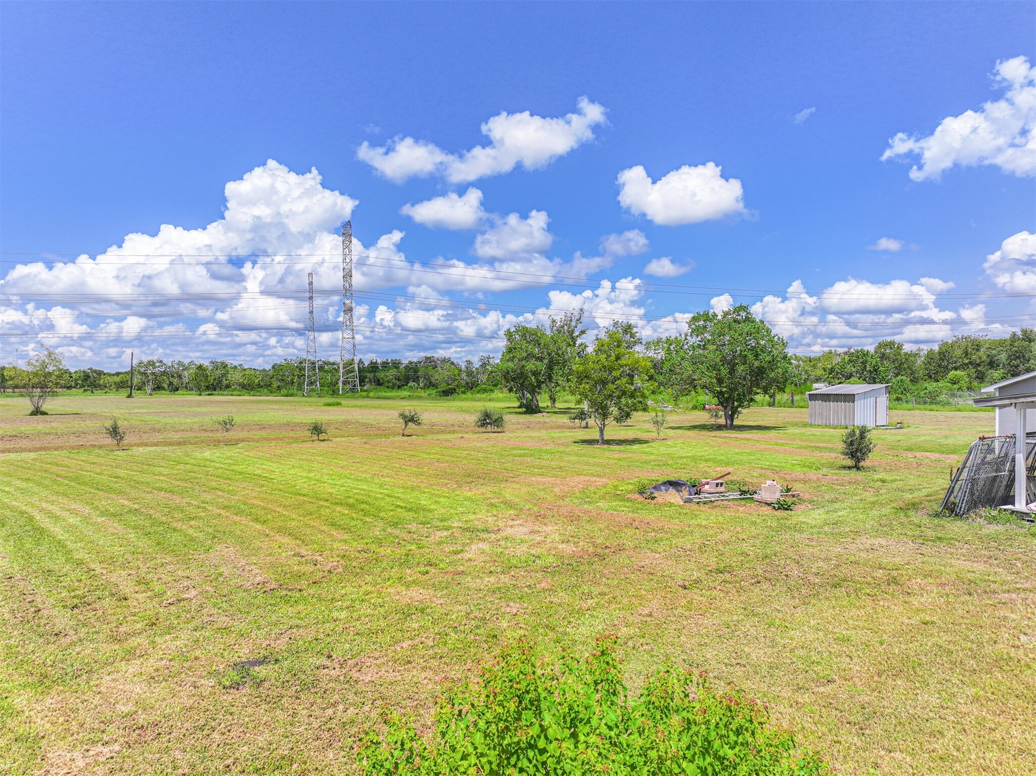 14515 Farm To Market Road 523 Angleton, TX 77515 - Photo 7 of 25 a view of a golf course with a lake view