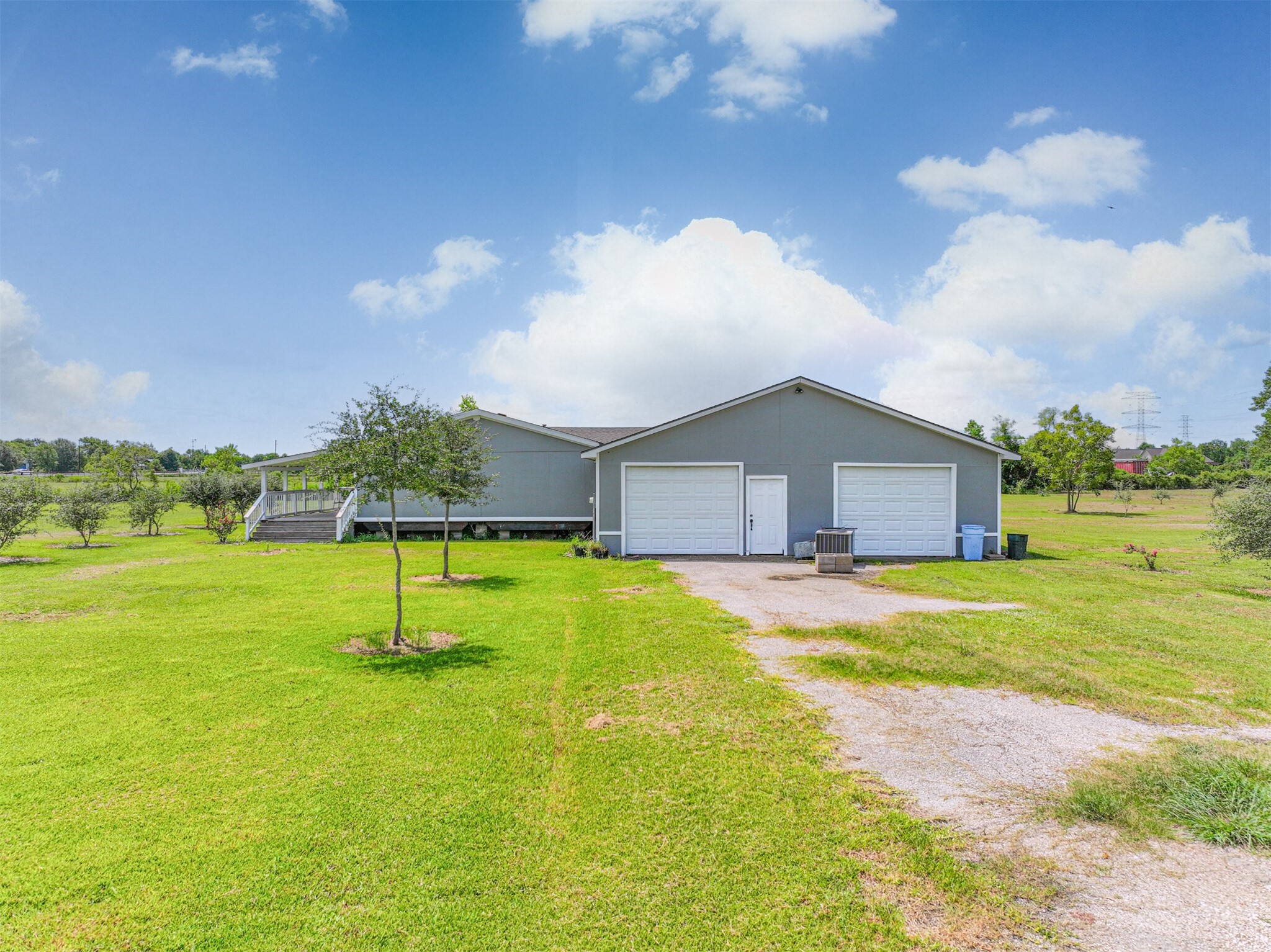 14515 Farm To Market Road 523 Angleton, TX 77515 - Photo 10 of 25 a swimming pool with wooden fence