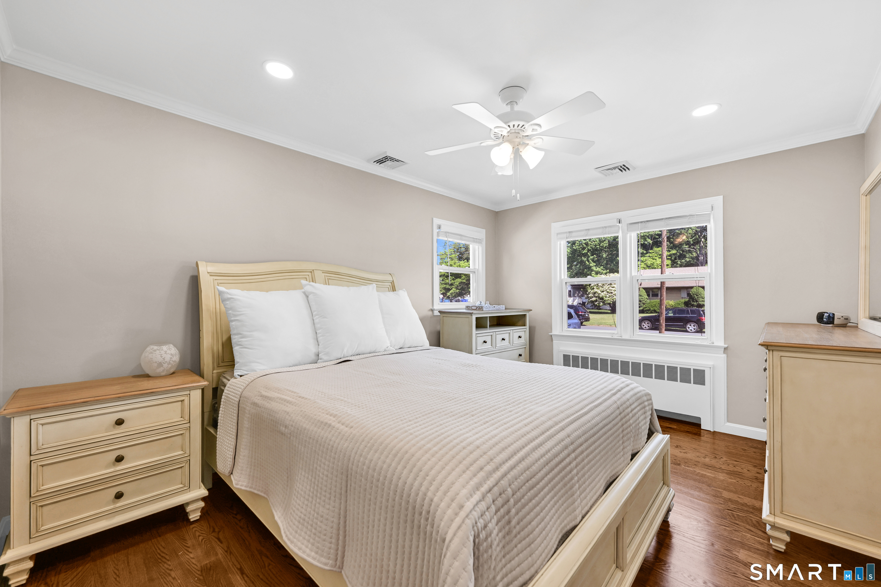 87 Lydall Road Newington, CT 06111 - Photo 14 of 35 a bedroom with a bed and a dresser