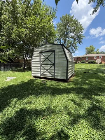 a view of backyard with green space