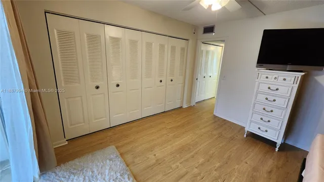 a view of room with flat screen tv