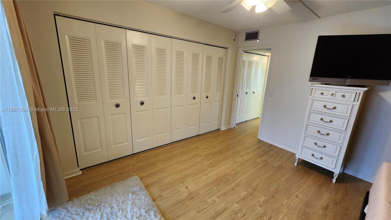 2079 Harwood F, Unit 2079 Deerfield Beach, FL 33442 - Photo 12 of 33 a view of room with flat screen tv