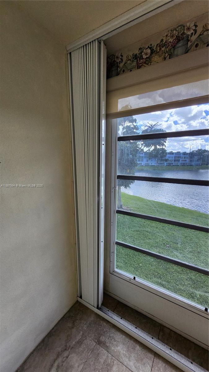 2079 Harwood F, Unit 2079 Deerfield Beach, FL 33442 - Photo 17 of 33 a view of room with a window