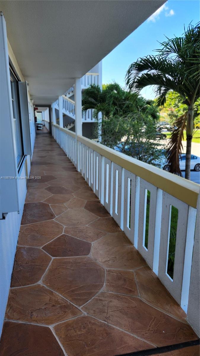 2079 Harwood F, Unit 2079 Deerfield Beach, FL 33442 - Photo 25 of 33 a view of balcony with furniture
