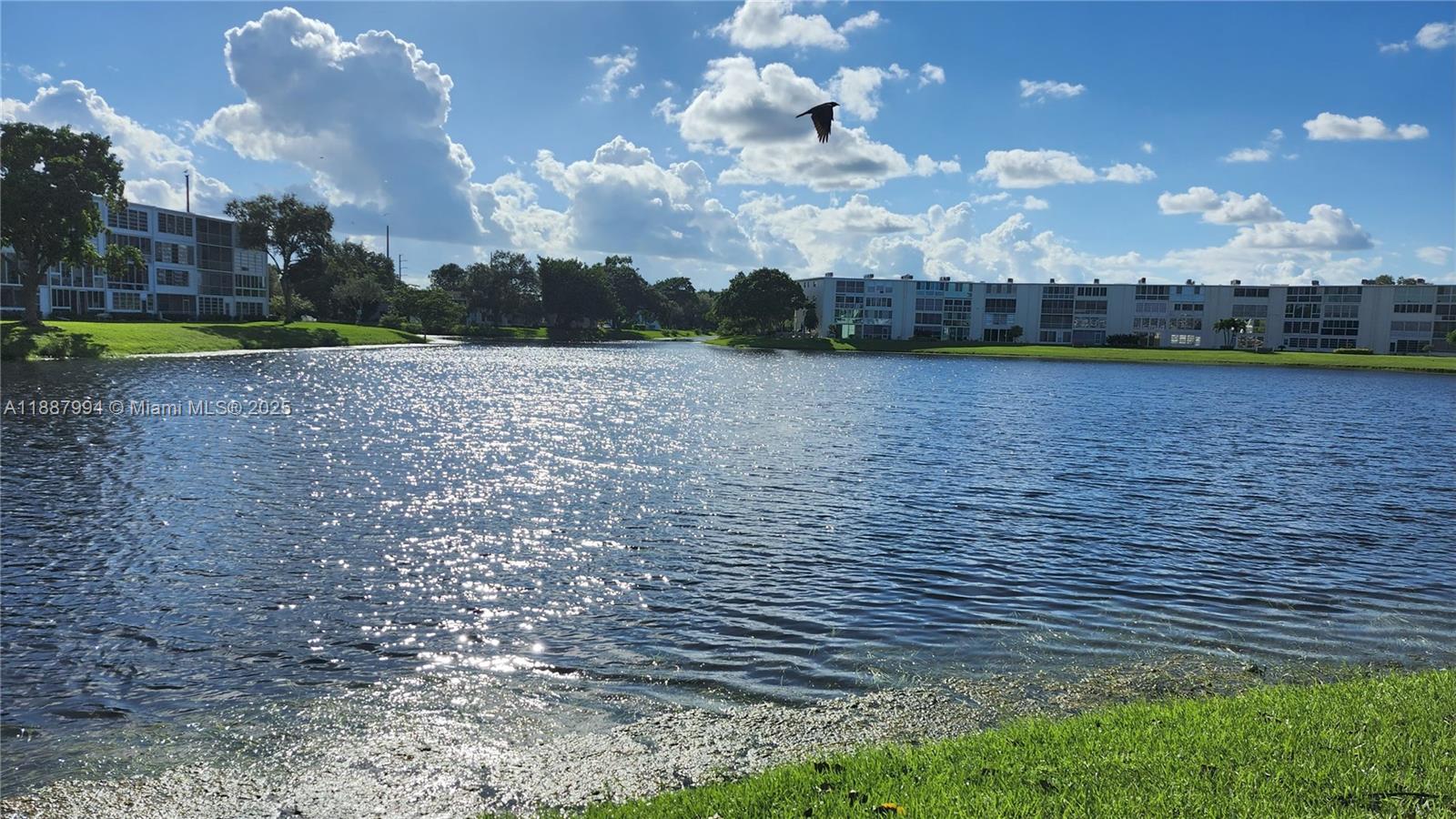 2079 Harwood F, Unit 2079 Deerfield Beach, FL 33442 - Photo 27 of 33 a view of a lake