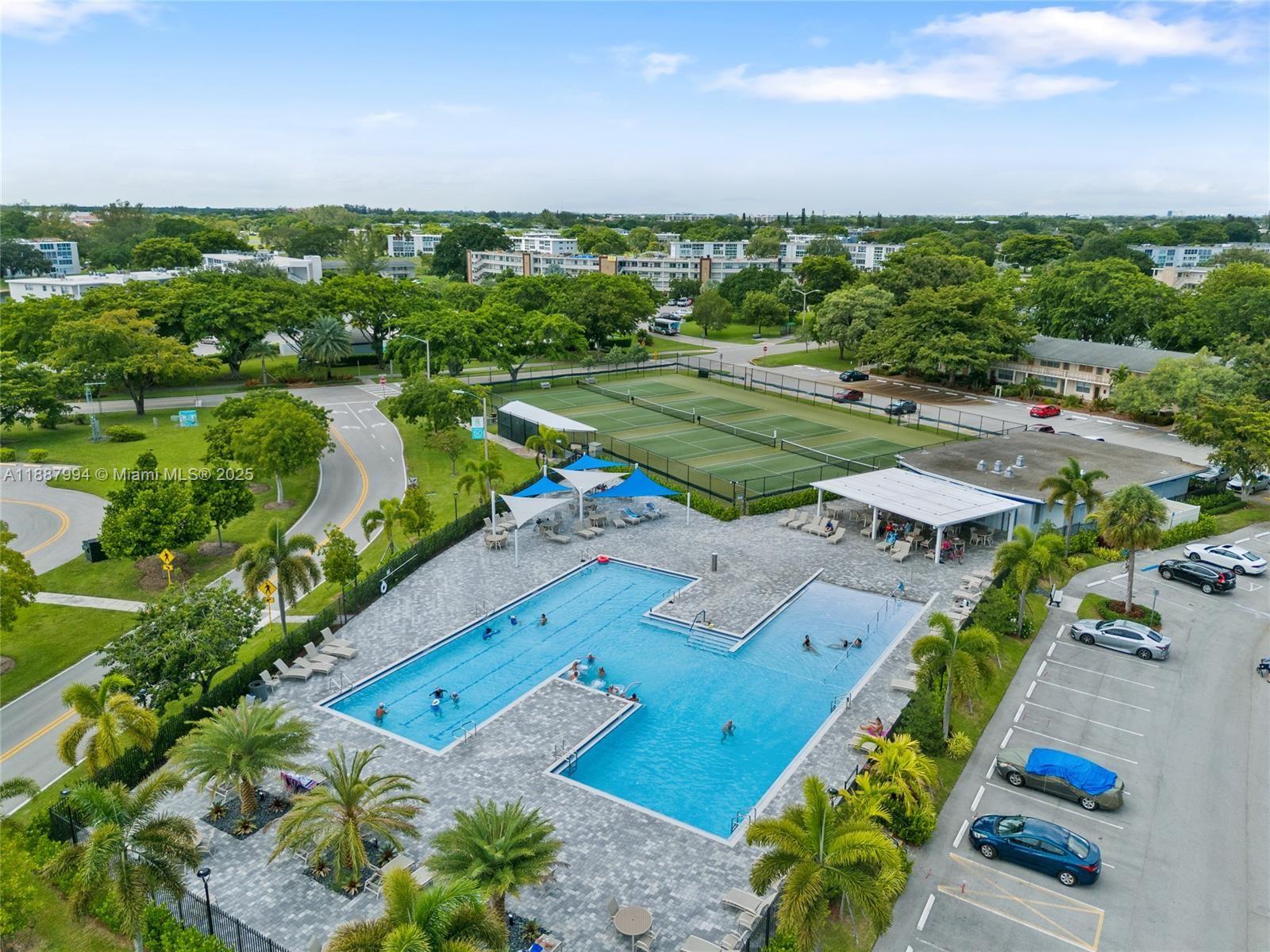 2079 Harwood F, Unit 2079 Deerfield Beach, FL 33442 - Photo 29 of 33 an aerial view of a city