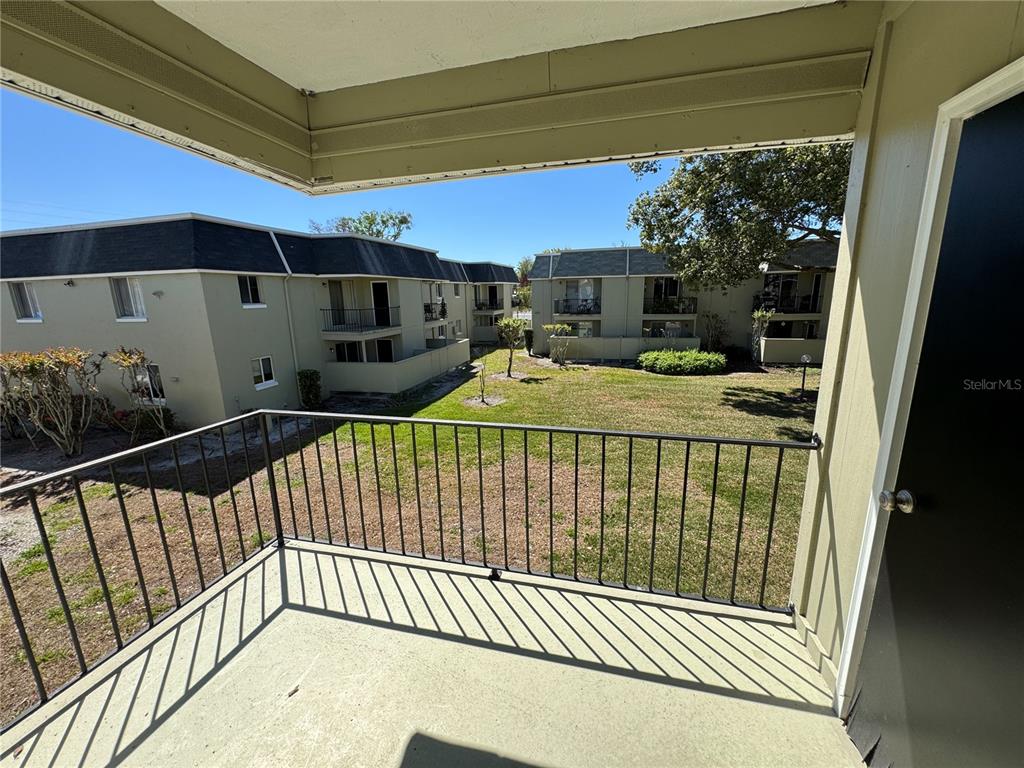 525 South Conway Road, Unit 220 Orlando, FL 32807 - Photo 11 of 12 a view of a balcony