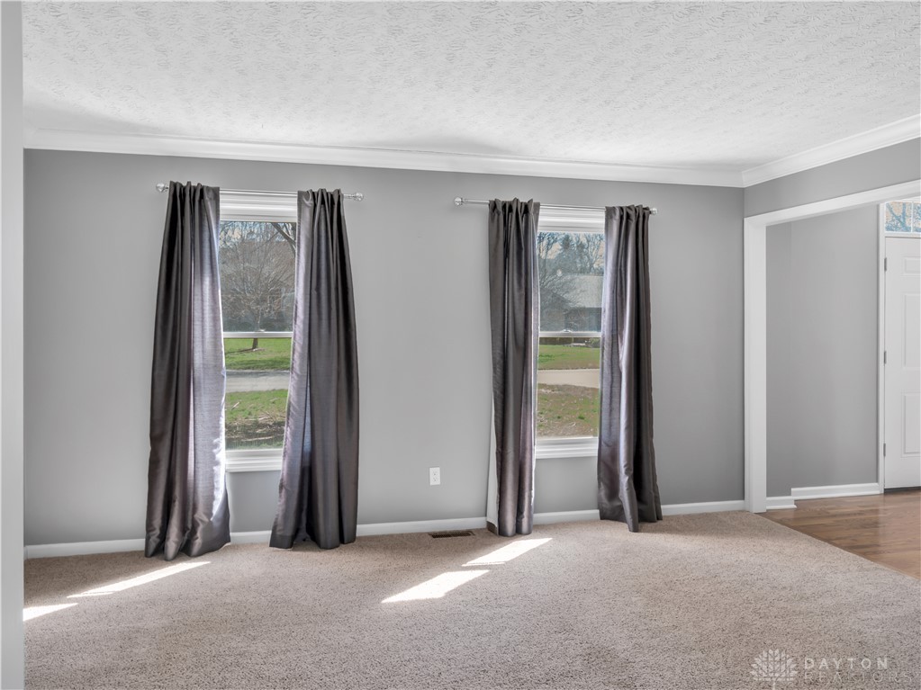 25 Callaway Springboro, OH 45066 - Photo 20 of 51 This bright living space features abundant natural light, creating an inviting atmosphere for relaxation and daily living.
