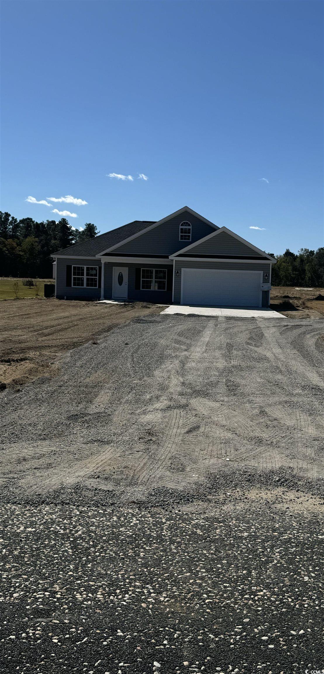 Ranch-style house with a garage