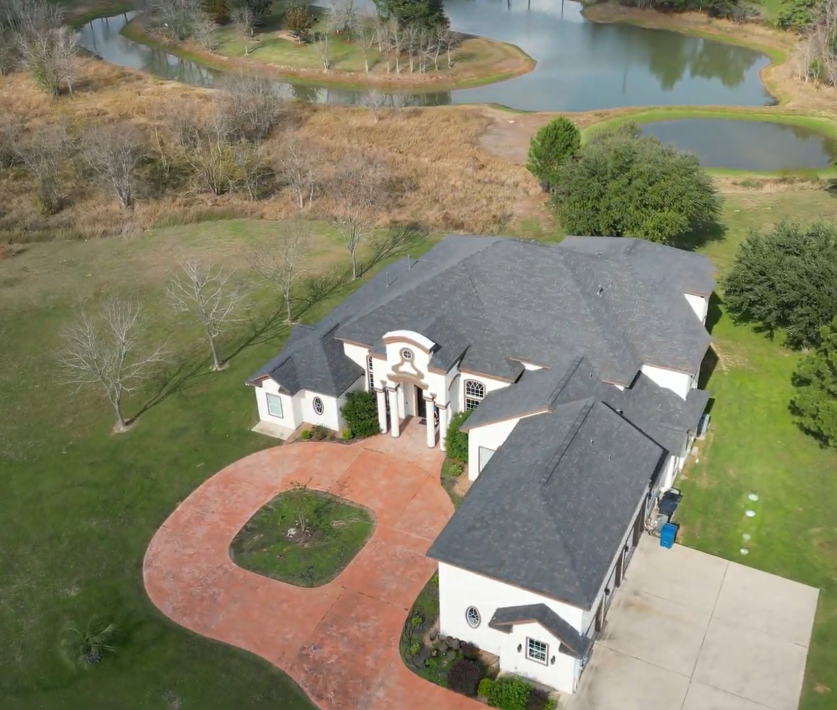 943 High Meadow Ranch Drive Magnolia, TX 77355 - Photo 47 of 50 AERIAL FRONT + DRIVEWAY